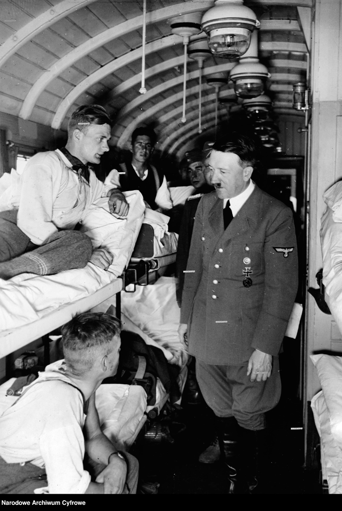 Hitler talking to wounded German soldiers in a sickbay near the eastern front in Poland